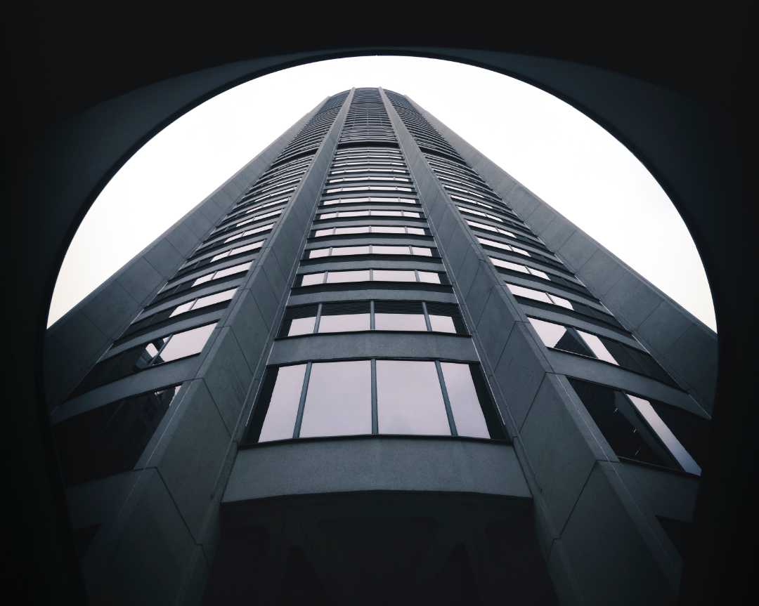 Image of a tall building taken from the base looking up